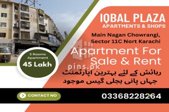 Iqbal Plaza Apartments and shops at main Nagan Chowrangi Karachi