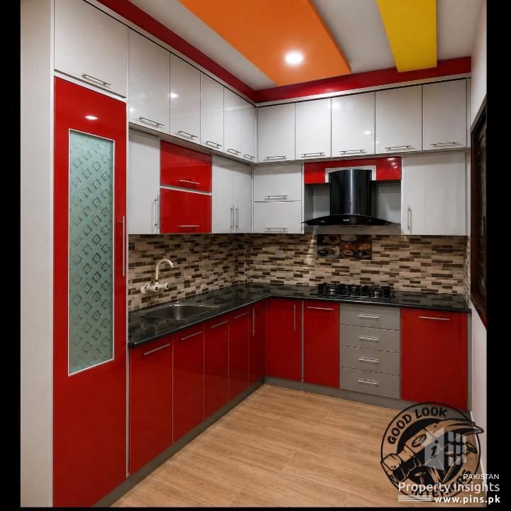 Stylish red and grey L-shape kitchen design with a modern full-height layout